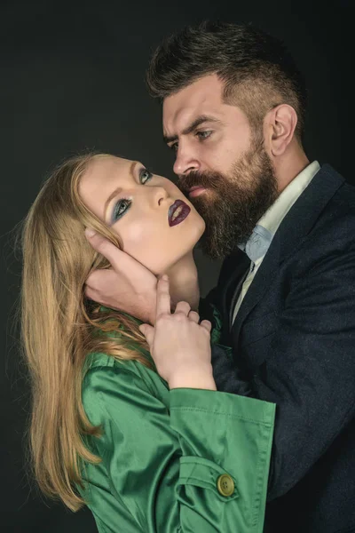 Seeing the best in your lover. Fashion style and hair care. Bearded man hug woman with long hair. Couple in love. Style icons. Intimate couple in fashion clothing. They both love fashion — Stock Image Seeing the best in your lover. Fashion style and hair care. Bearded man hug woman with long hair. Couple in love. Style icons. Intimate couple in fashion clothing. They both love fashion Royalty Free Stock Photos
