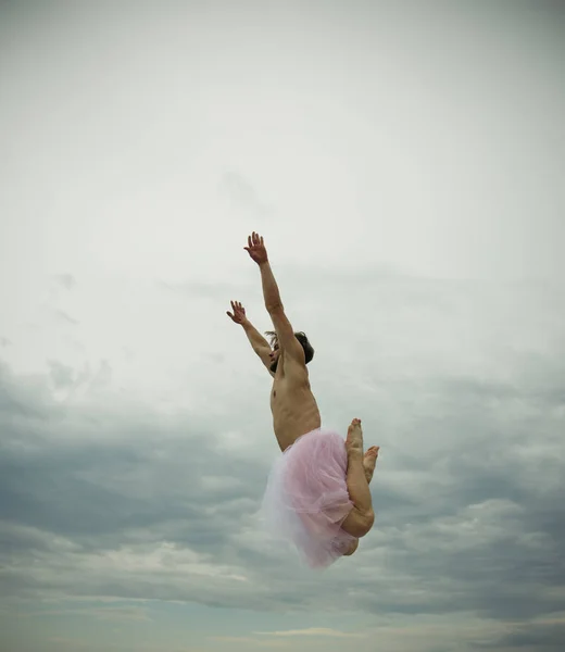 Inspiration and dreaming. Man in ballerina skirt outdoor. Funny man freak. Crazy ballerina. drag queen. Man dancing in tutu in ballet studio. i am free. he loves dancing. i believe i can fly.