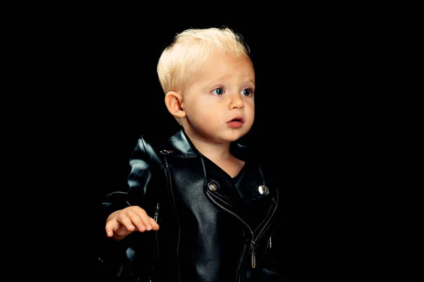 Lets rock. Little rock star. Little child boy in rocker jacket. Rock style child. Rock and roll fashion trend. Adorable small music fan. Music for children