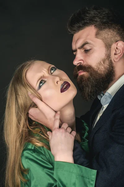 Increasing the romance in couple. Intimate couple in fashion clothing. They both love fashion. Couple in love. Bearded man hold woman with long hair. Fashion style and hair care. Style icons — Stock Image Increasing the romance in couple. Intimate couple in fashion clothing. They both love fashion. Couple in love. Bearded man hold woman with long hair. Fashion style and hair care. Style icons Royalty Free Stock Images