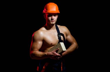 O inşaat için geldiğinde biz her şeyi. Adam işçi tuğla kas elinde tut. İnşaat işçisi veya Oluşturucu site oluşturma, iş yerinde. Çimento işçi. Kaslı adam duvar çalışması yok