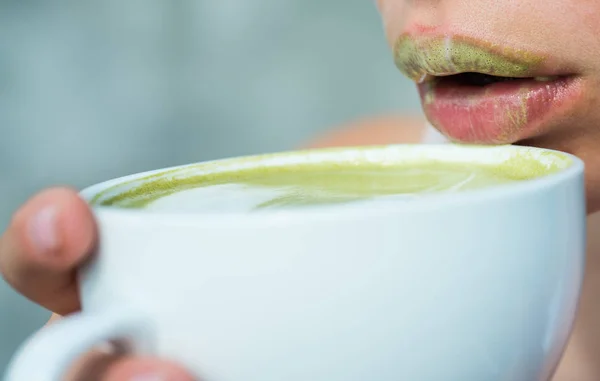 Matcha latte tea ceremony of girl. woman relax in cafe and drinking. Best tea ever. Getting warm with hot tea. sexy lips of woman drink japanese tea from cup. perfect morning with green coffee — Stock Photo, Image