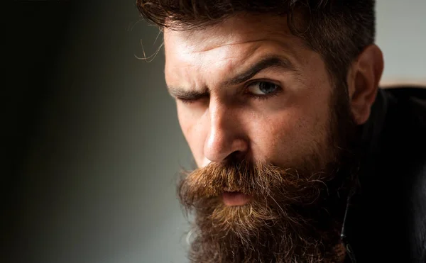 Closeup man portrait. Man face. Handsome bearded man. Sad or stress man. Hipster.