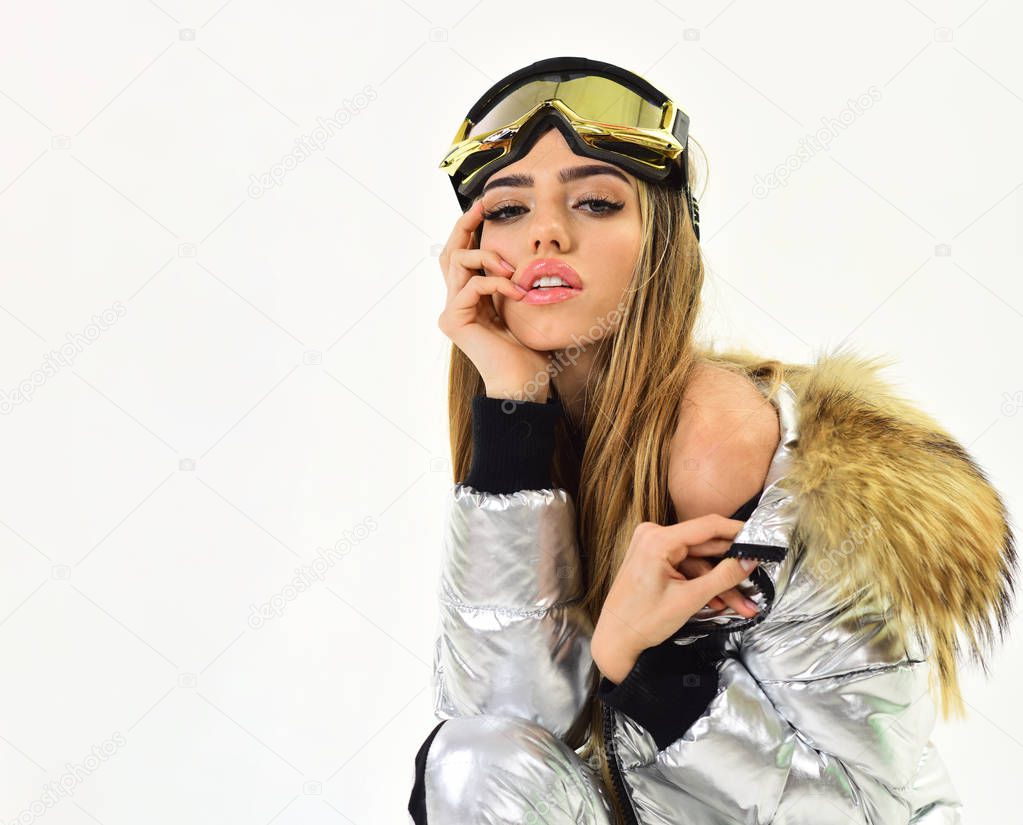 Feeling rested. Beautiful winter. Sexy woman in winter clothes. Happy winter holidays. Girl in ski or snowboard wear. Winter sport and activity. Ski resort and snowboarding, copy space