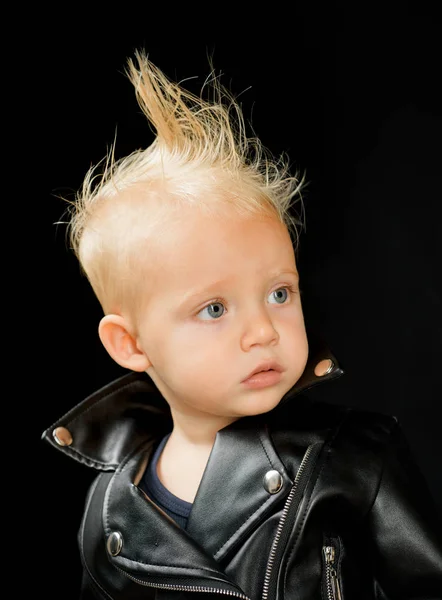 Rock music is always superior. Adorable small music fan. Little rock star. Little child boy in rocker jacket. Rock style child. Rock and roll fashion trend. Music for children
