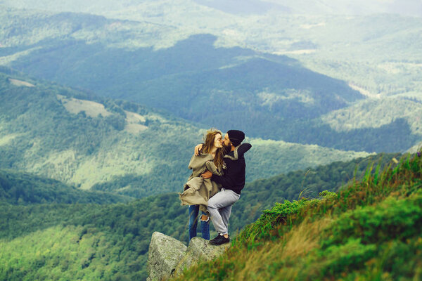 Romantic couple on mountain top