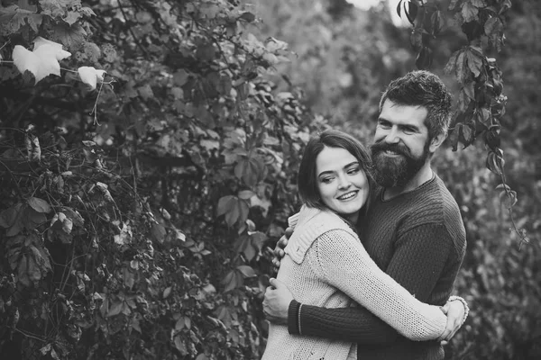 Couple with smiling faces cuddle each other with tenderness. — Stock Photo, Image