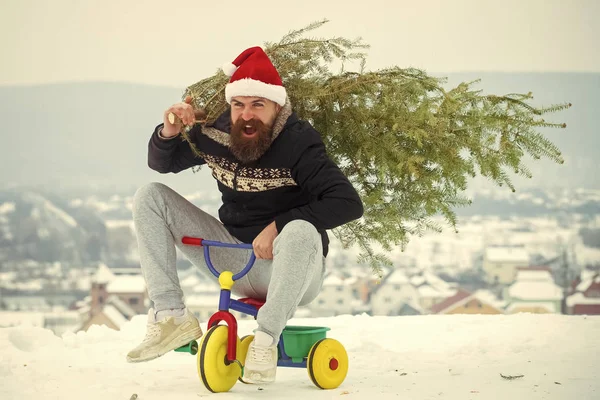 Heyecanlı bisikletçi Santa şapka ve sportif giyim