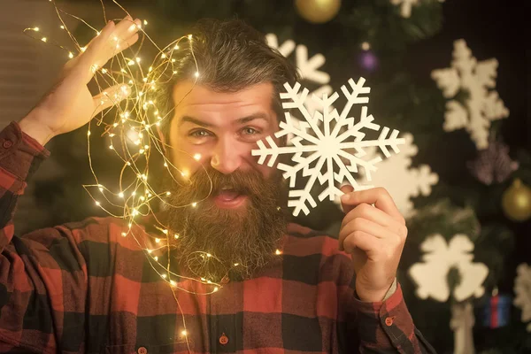 Garland on santa claus man as decoration. — Stock Photo, Image