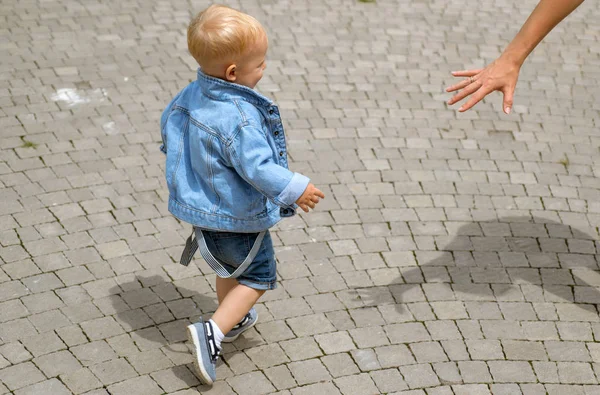 Lets just go walking. Baby boy. Little baby walk outdoor. Small baby on day care. Improving child health and growth. Emotional and physical growth. Early child health care — Stock Photo, Image