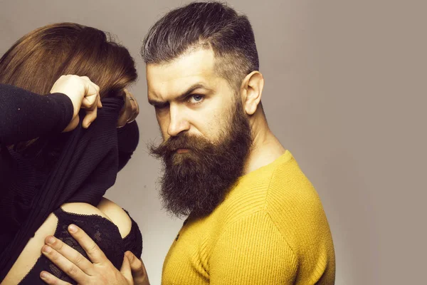 Bearded man touching female chest — Stock Photo, Image