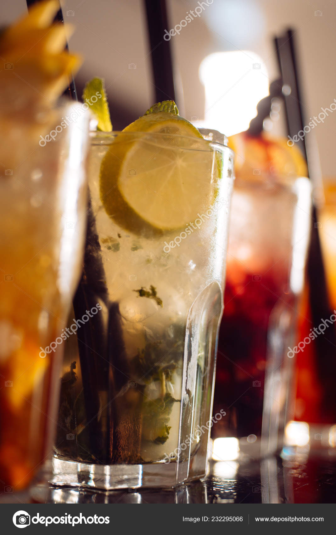 Afterwork drinks. Alcoholic mixed drinks with ice. Juicy beverages