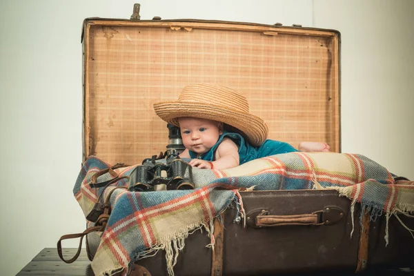 Very busy. Sweet little baby. New life and birth. Childhood happiness. Photo journalist. Small girl in suitcase. Traveling and adventure. Family. Child care. Portrait of happy little child — Stock Photo, Image