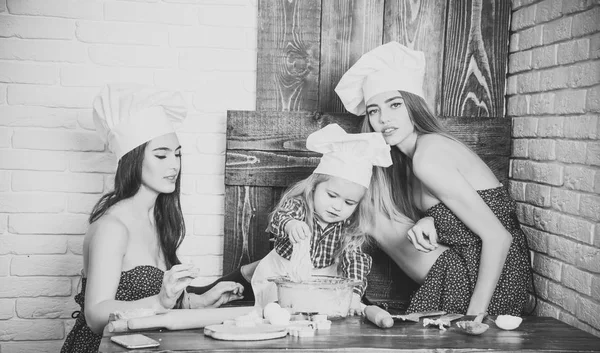 Child and women kneading dough — Stock Photo, Image