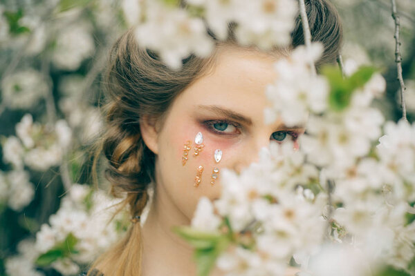 Face and skincare. womens health. allergy to flowers. Springtime vacation. weather forecast. Natural beauty and spa therapy. Woman with spring fashion makeup. Summer girl at tree. Spring in my head.