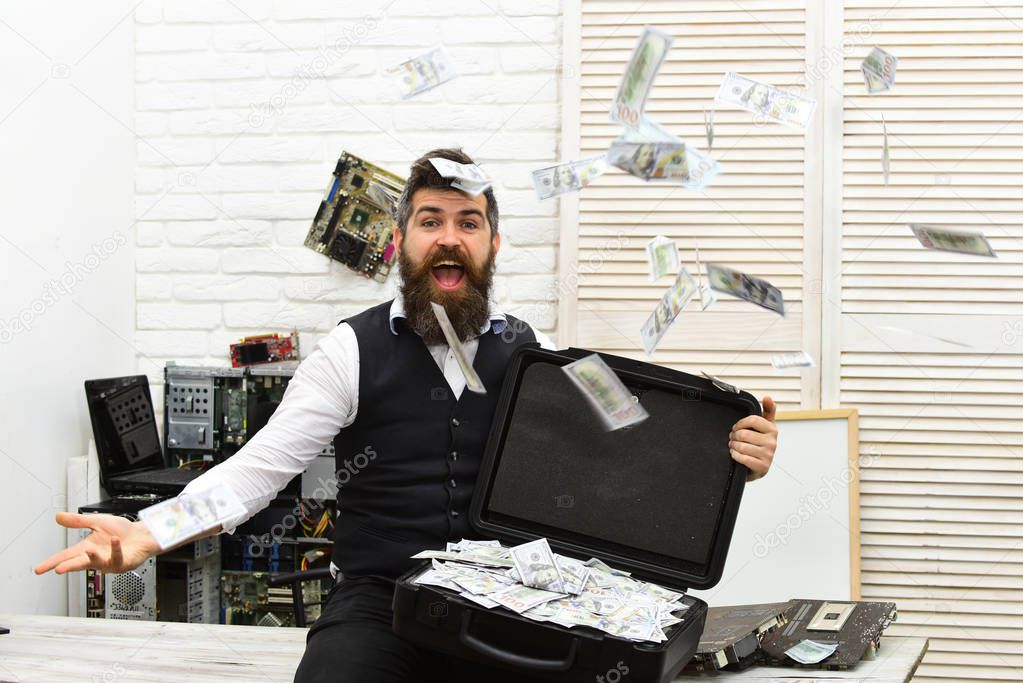 Getting cash rich. Bearded man throwing cash money. Bearded businessman with dollar banknotes. Rich man with money case in office. Withdrawing cash from electronic money. Business and making money