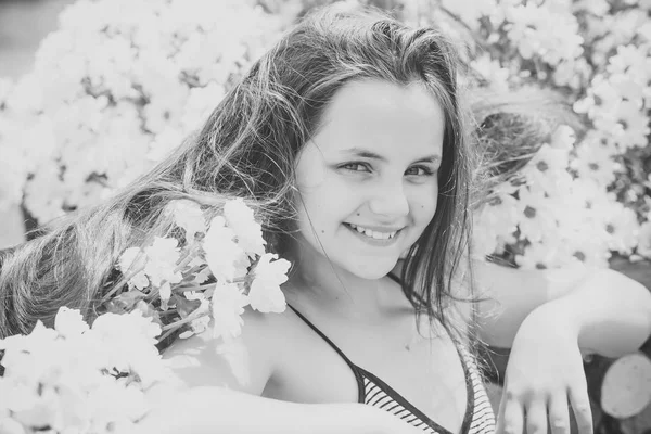 Spring blossom and young girl — Stock Photo, Image