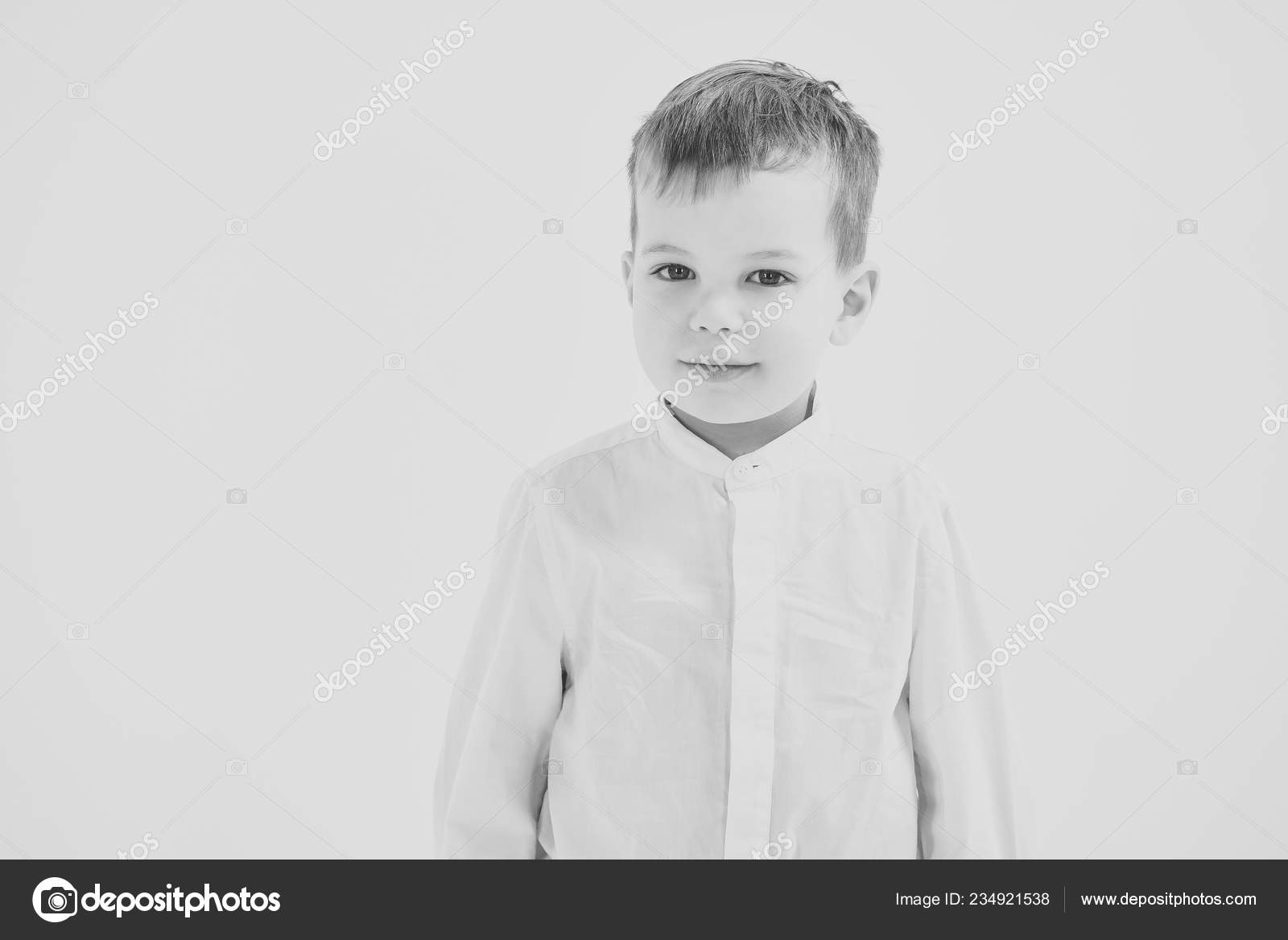Little boy in white shirt, business. Stock Photo by 234921538