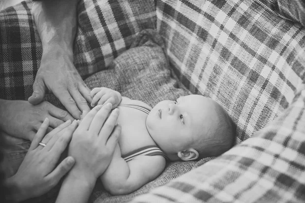 Hands on infant belly — Stock Photo, Image