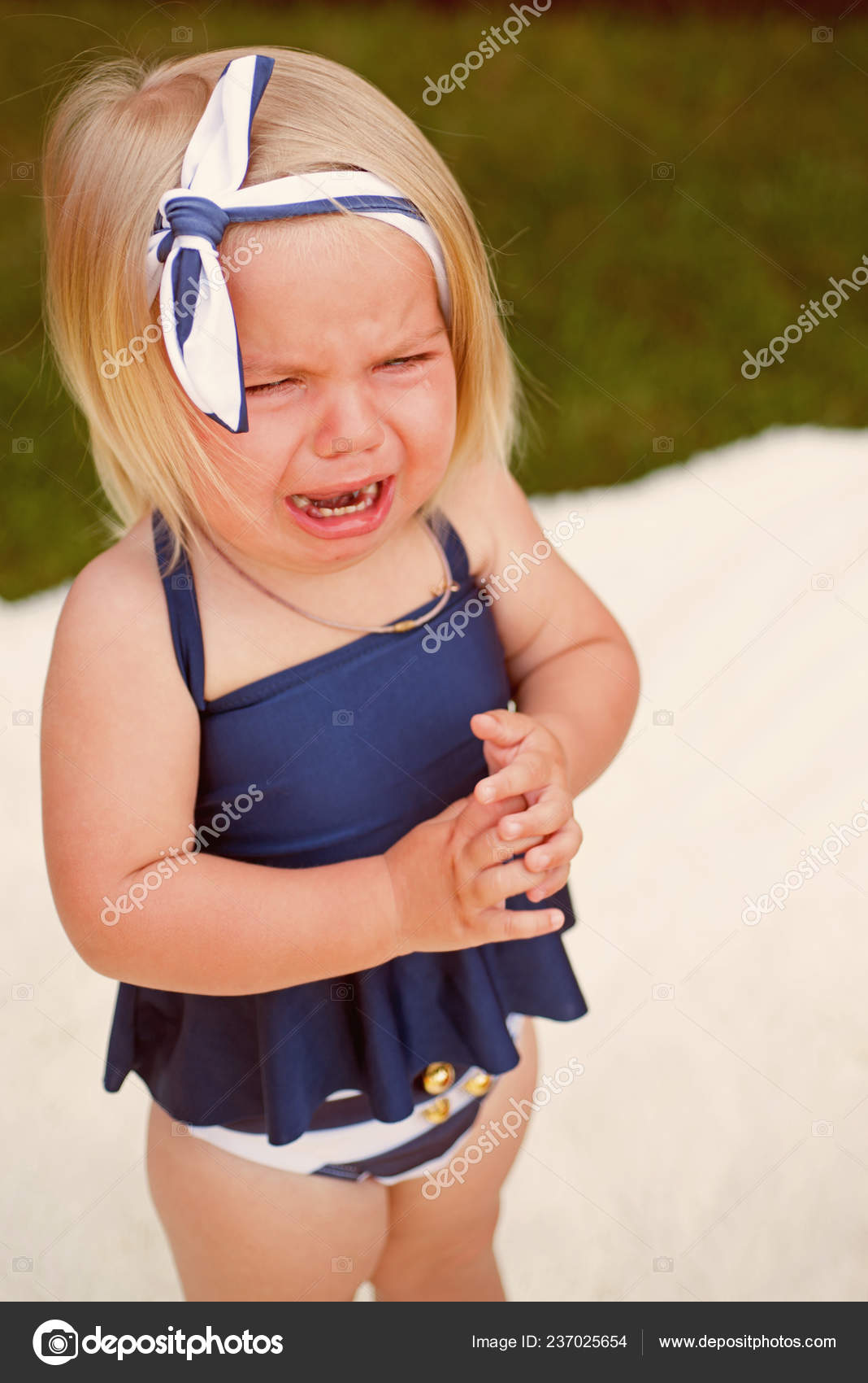 small girl crying