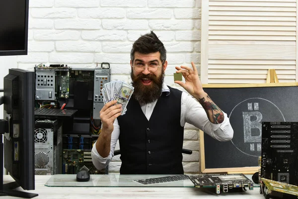 We will do the mining for you. Bitcoin miner man in server room. Bearded businessman with computer circuits and dollars. Bearded man bitcoiner. Virtual currency. Crypto currency mining hardware