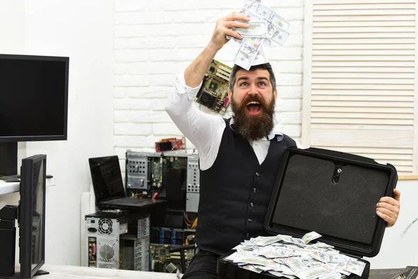Finally rich. Withdrawing cash from electronic money. Bearded man with cash money. Business man with money case in office. Bearded hipster with dollar banknotes. Business and making money — Stock Photo, Image