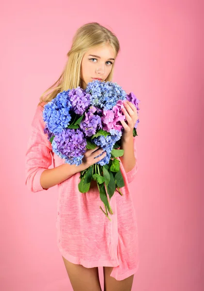 Summer beauty. girl with summer makeup. Makeup cosmetics and skincare. Spring woman with hydrangea flowers. Fashion portrait of woman. Healthy hair and skin. Greeting card for Valentines Day