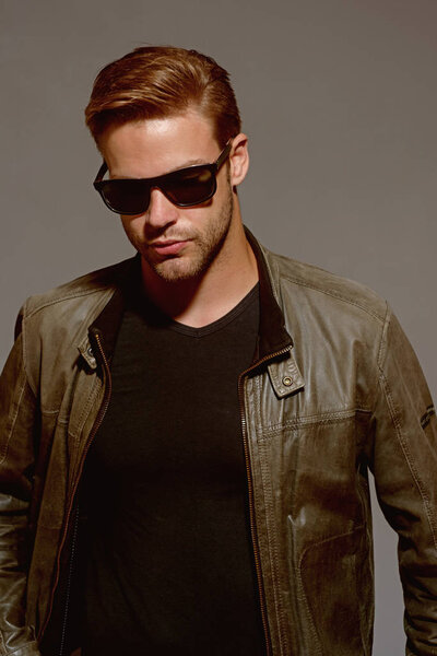 Looking trendy. Fashion model in trendy sun glasses. Handsome man wear eye glasses. Man of fashion. Fashion eyewear. Suitable for everyday wear