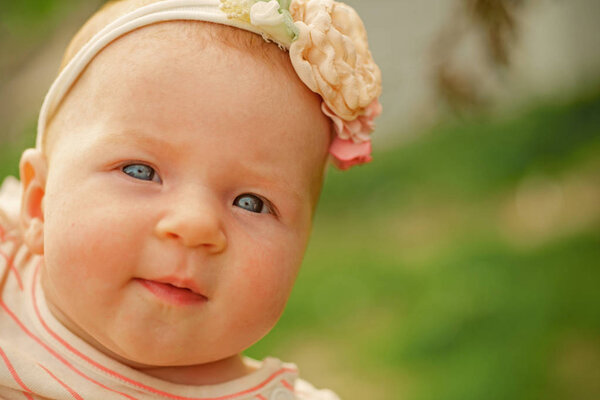 Little baby happy smiling. Happy baby girl. Growth and future. Happy childhood. Providing growth and development of little child, copy space