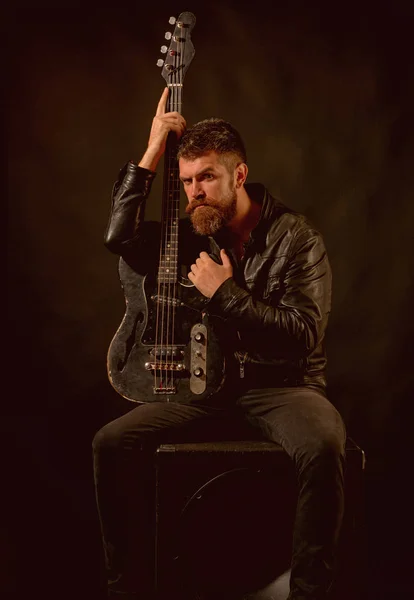 Me and my guitar. Bearded man hold guitar. Punk rock star with beard on serious face. Music is my life. In search of inspiration — Stock Photo, Image