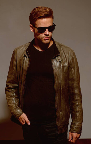 My glasses as unique as me. Fashion eyewear. Handsome man wear eye glasses. Fashion model in trendy sun glasses. Man of fashion. Masculine and powerful.