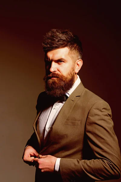 The fashion business has to change. Business as usual. Mens fashion. Bearded man after barber shop. Man with long beard in business wear. Every barber knows