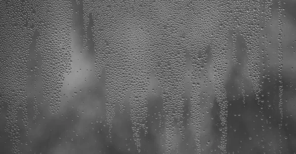 Droplets or drops of water on misted glass. — Stock Photo, Image