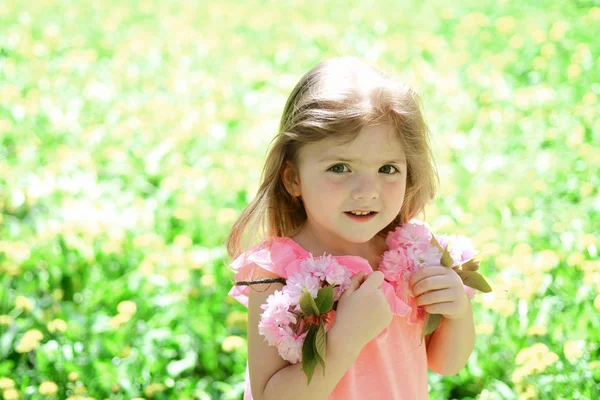 Great pleasure. Summer girl fashion. Happy childhood. Springtime. weather forecast. face and skincare. allergy to flowers. Small child. Natural beauty. Childrens day. Little girl in sunny spring — Stock Photo, Image