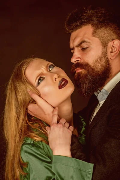 Increasing the romance in couple. Intimate couple in fashion clothing. They both love fashion. Couple in love. Bearded man hold woman with long hair. Fashion style and hair care. Style icons — Stock Image Increasing the romance in couple. Intimate couple in fashion clothing. They both love fashion. Couple in love. Bearded man hold woman with long hair. Fashion style and hair care. Style icons Royalty Free Stock Images