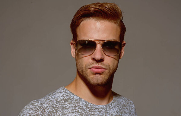 Giving the man confidence and precision. Fashion eyewear. Handsome man wear eye glasses. Fashion model in trendy sun glasses. Man of fashion. Weaving the unique blend of luxury into the eyeglasses