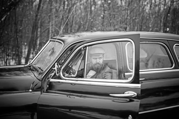 Retro collection car and auto repair by mechanic driver. Bearded man and sexy woman in car. Travel and business trip or hitch hiking. Escort of girl by security. Couple in love on romantic date — Stock Photo, Image