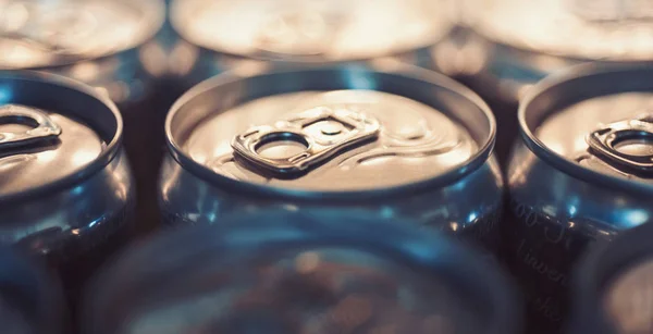 Perfect for drinking on the go. Drink cans. Pull tabs on cans tops. Aluminum beverage cans. Metal containers designed for packaging of drinks and food. Carbonated drinks. Alcoholic or energy drinks