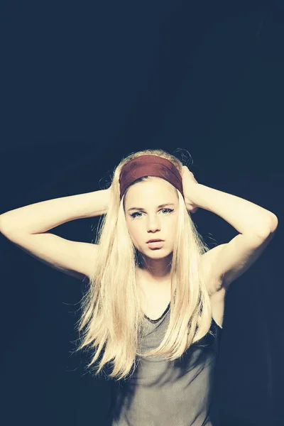 Girl in blonde wig, hairdresser.