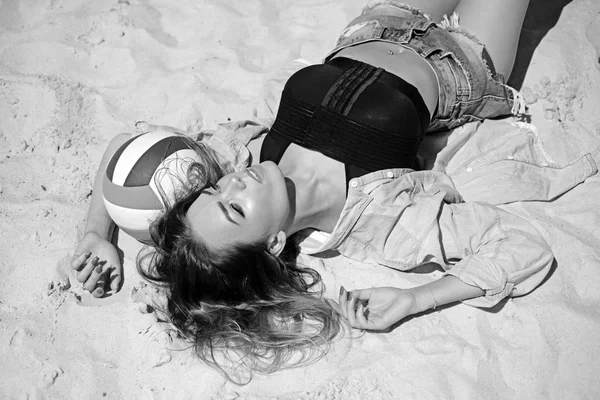 Relaxing in complete solitude. Sexy woman lying on sand. Pretty woman relax on summer day. Sensual woman enjoy idyllic summer vacation. Sexi woman on sunny beach — Stock Photo, Image