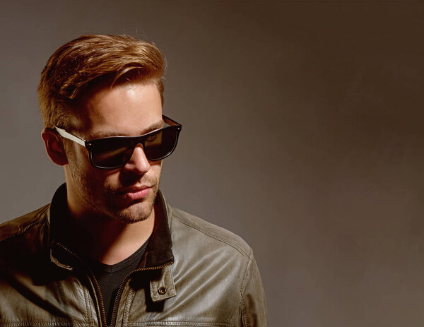 My glasses are an extension of my personality. Fashion eyewear. Handsome man wear eye glasses. Fashion model in trendy sun glasses. Man of fashion. Perfect for accessorizing your look, copy space