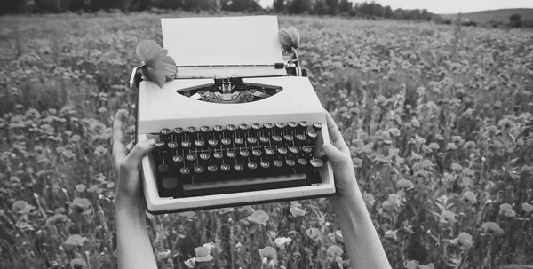 Vintage typewriter in hand, education, business, grammar. — Stock Photo, Image
