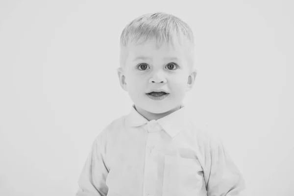 Child with happy face isolated on white, white party. — Stock Photo, Image