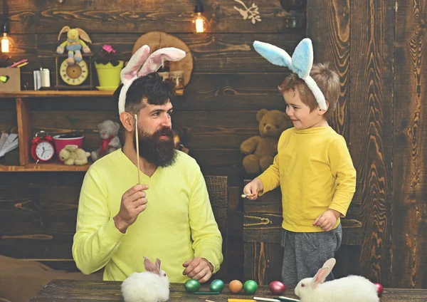 Easter family with fake bunny ears.