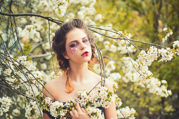 Time to relax. Woman with spring fashion makeup. face skincare. womens health. allergy to flowers. Natural beauty and spa therapy. Springtime vacation. weather forecast. Summer girl at blooming tree.