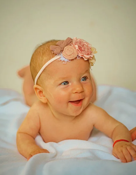 Happy newborn baby. Newborn baby girl. Happy and cute. Health care. Child psychologist. Asking advice of a psychologist. Advice and support. A day care center with heart