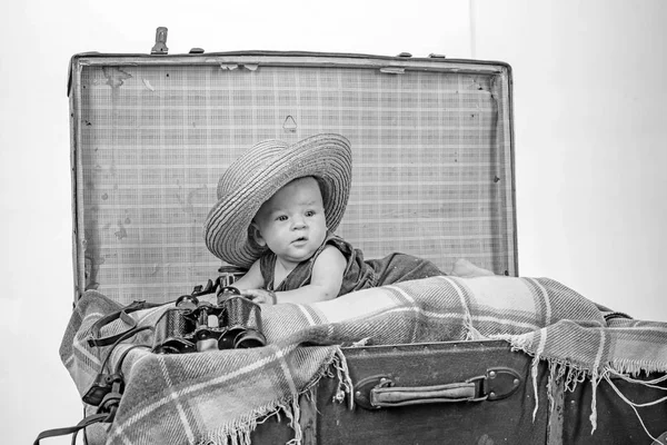 Interesting activity. Family. Child care. Small girl in suitcase. Traveling and adventure. Sweet little baby. New life and birth. Portrait of happy little child. Childhood happiness. Photo journalist