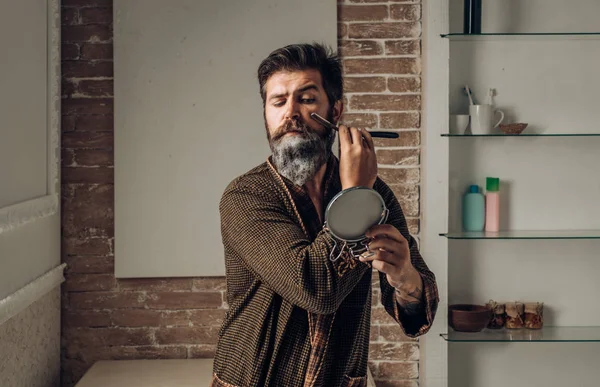 Beard man visiting hairstylist in barber shop. Bearded man getting haircut by hairdresser at barbershop. Hair Stylist and Barber. Hair salon and barber vintage. — Stock Photo, Image