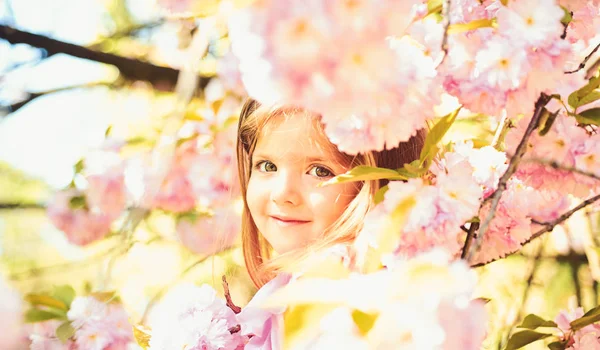 Pleasant spring day. Small child. Natural beauty. Childrens day. Summer girl fashion. Happy childhood. face and skincare. allergy to flowers. Springtime. weather forecast. Little girl in sunny spring — Stock Photo, Image