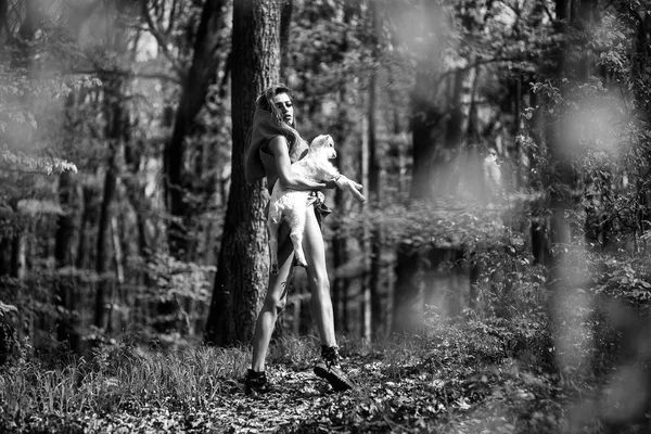 Young girl with goat in forest — Stock Photo, Image